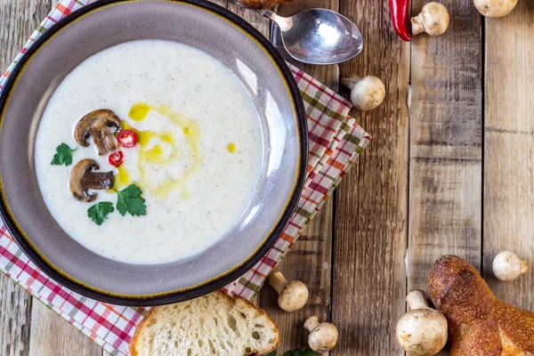 Creamy Mushroom Soup on rustic wooden table — Stock Image Creamy Mushroom Soup on rustic wooden table Stock Picture