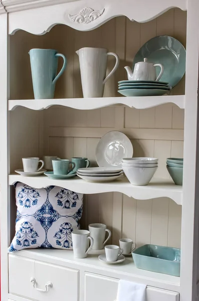 Kitchen cupboard with dinnerware
