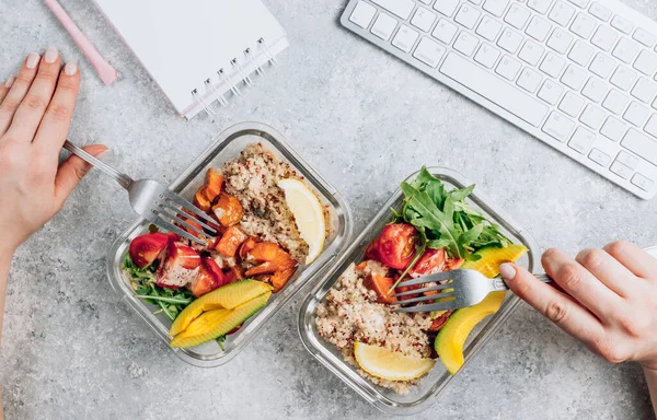 Vegetarian healthy meal prep containers . Raw vegetables and quinoa for lunch on light workspace. Vegan, healthy, detox food concept. Selective focus