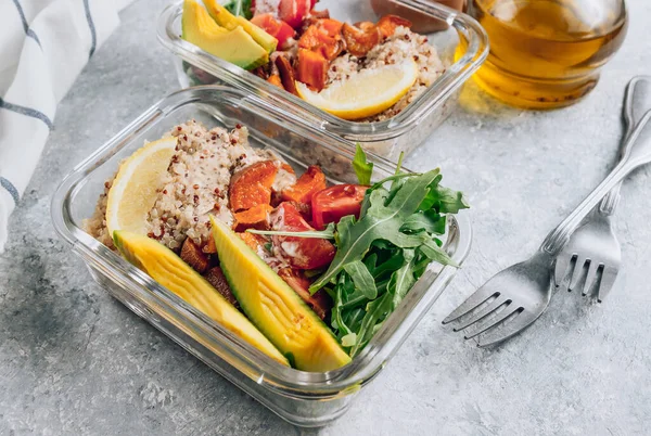 Vegetarian healthy meal prep containers . Raw vegetables and quinoa for lunch on light table. Vegan, healthy, detox food concept. Selective focus