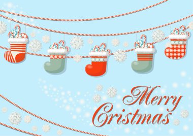 Kar taneleri ve çorap tatlılar ve c dolu Noel çelenk