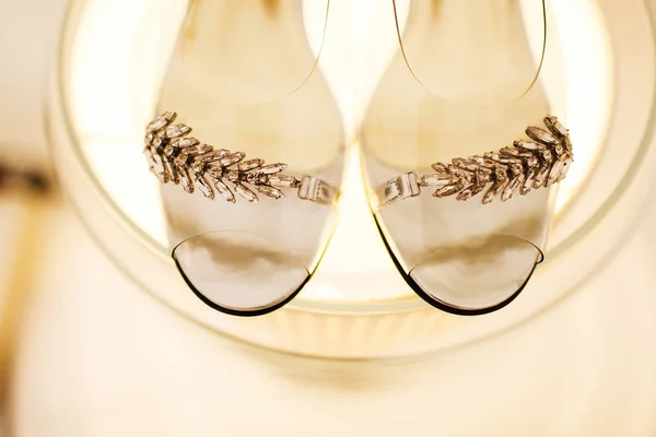 Wedding shoes and a lamp — Stock Photo, Image