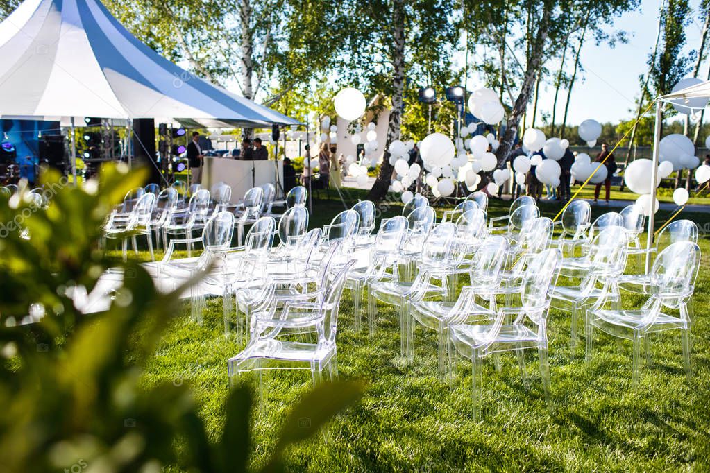 Outdoor wedding ceremony in the forest with large balls