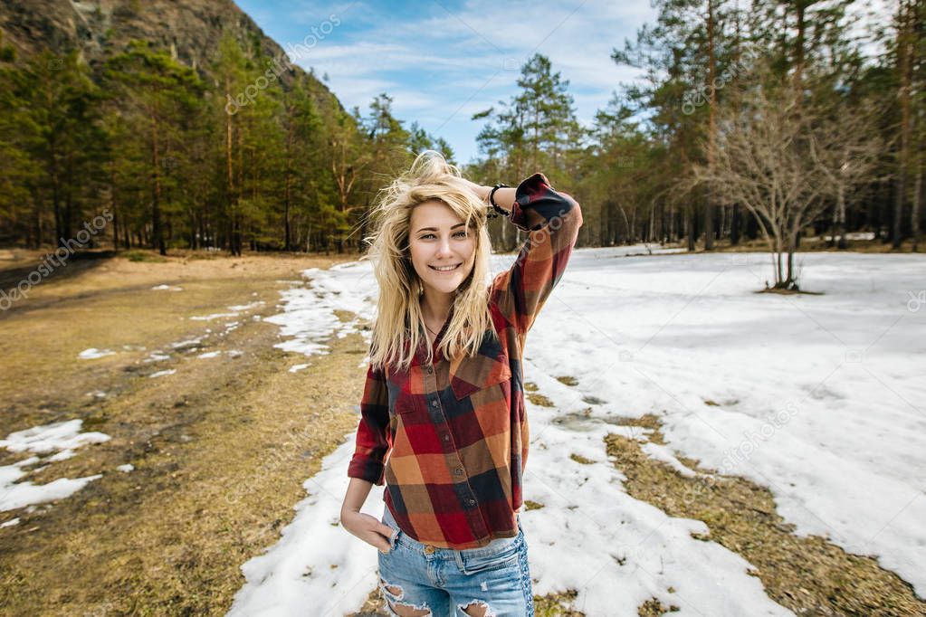 blonde girl in the plaid shirt