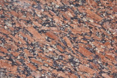 Siyah ve beyaz damarlı kırmızı mermer dokusu