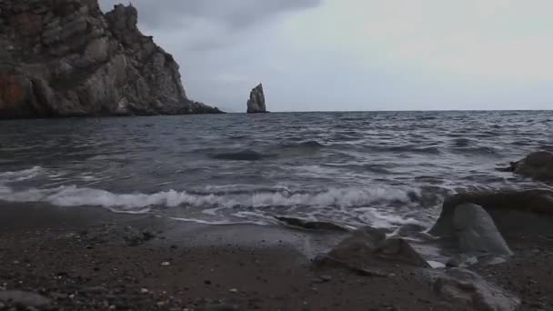 Black sea the ship sails on the sea on the horizon, storm sea brown. — Stock Video