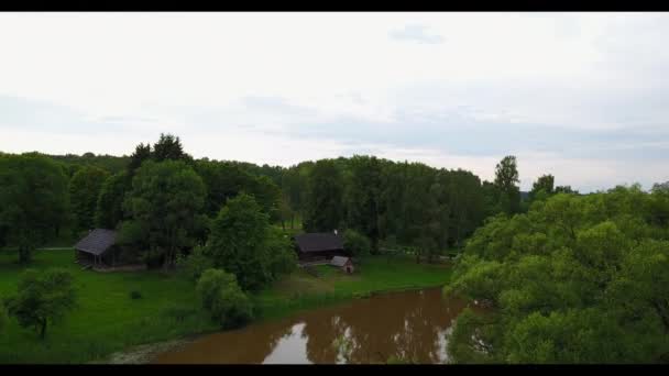 Flights on the copter over green gardens with rivers — Stock Video