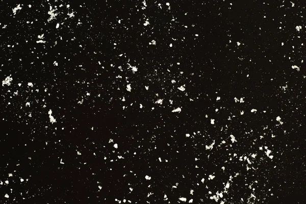 Vallende sneeuw op zwarte achtergrond. Sneeuwstorm textuur. — Stockfoto