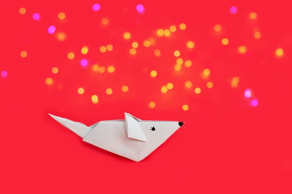 Cute white origami paper rat and on red background. — Stock Photo, Image