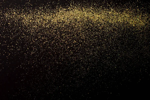 Christmas Gold glitter on black background. Holiday abstract — Stock Photo, Image