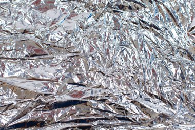 Buruşmuş gümüş alüminyum folyo kaplama arka plan