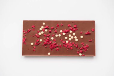 Chocolate bar with dried raspberries and rice chips