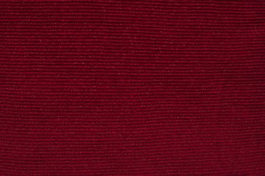 Koyu kestane rengi örgü kumaş, gümüş iplik, tekstil arka plan. Koyu kırmızı örgü arka plan