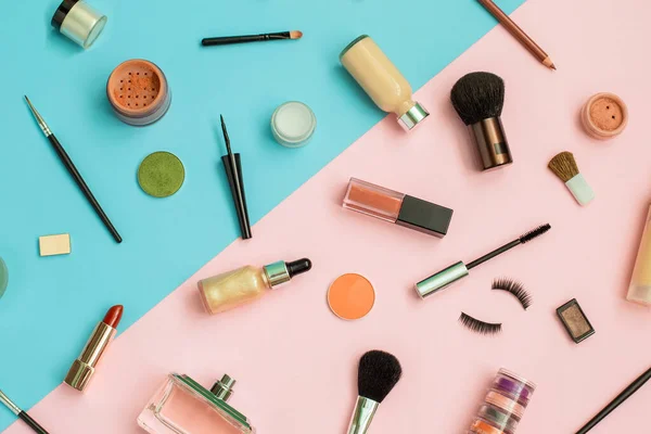 Set of Makeup professional cosmetics on color background. Makeup cosmetics tools background and beauty cosmetics