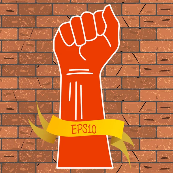 Vector illustration of a red hand clenched into a fist and a yellow ribbon with an inscription EPS10, on a brown brick wall background. — Stock Vector