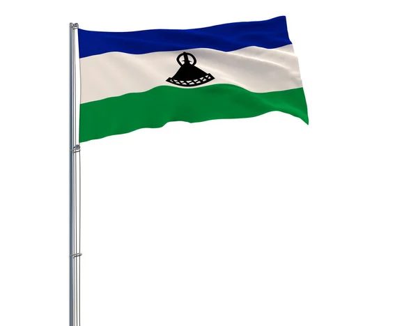 Izolovat vlajka Lesotha na stožáru vlaje ve větru na bílém pozadí. — Stock fotografie