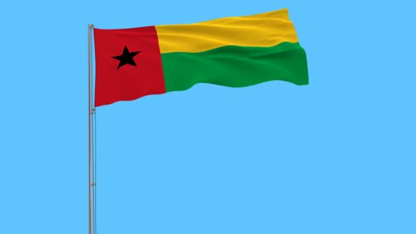 Isolera Guinea Bissaus Flagga Flaggstång Som Fladdrar Vinden Blå Bakgrund — Stockvideo