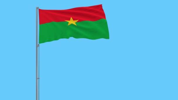Изолировать Флаг Буркина Фасо Флагштоке Развевающемся Ветру Синем Фоне Рендеринг — стоковое видео