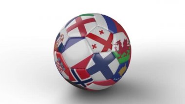 Soccer ball with flags of European countries rotates on white surface, loop 3