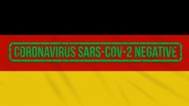 Koronavirüsten yeşil bir bayrak sallayan Almanya bayrağı