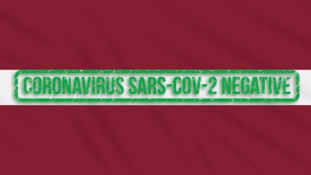 Latvia swaying flag with a green stamp of freedom from coronavirus, loop — Stock Video