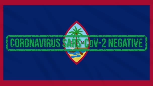 Guam swaying flag with green stamp of freedom from coronavirus, loop — Stock Video