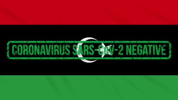 Libyen schwenkt Flagge mit grünem Stempel der Freiheit vom Coronavirus, Schleife — Stockvideo