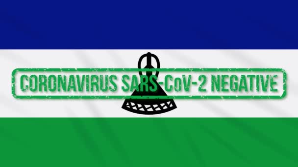 Lesotho zwaaiende vlag met groene stempel van de vrijheid van coronavirus, lus — Stockvideo