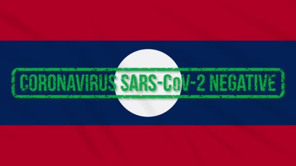 Laos balanceo bandera con sello verde de la libertad de coronavirus, bucle — Vídeos de Stock
