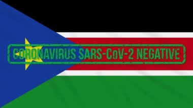 Koronavirüsten yeşil bir bayrak sallayan Güney Sudan bayrağı.
