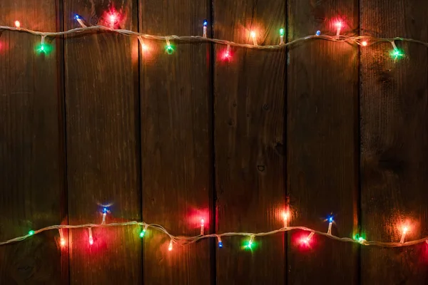 Noel arka plan. ışıklar ve serbest metin alanı ile dalgalı ahşap