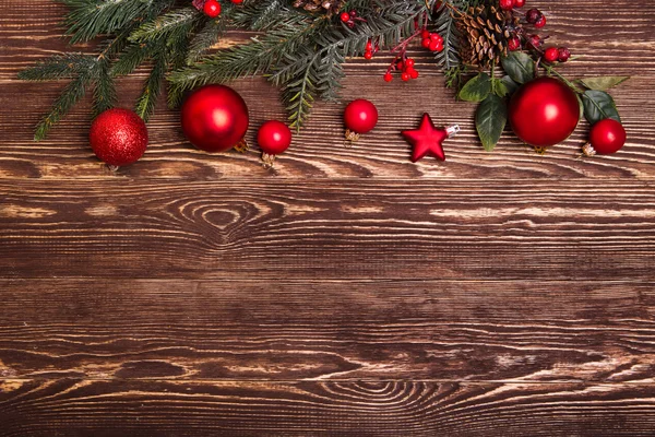 Christmas design - Merry Christmas. Xmas wreath card on wooden background.