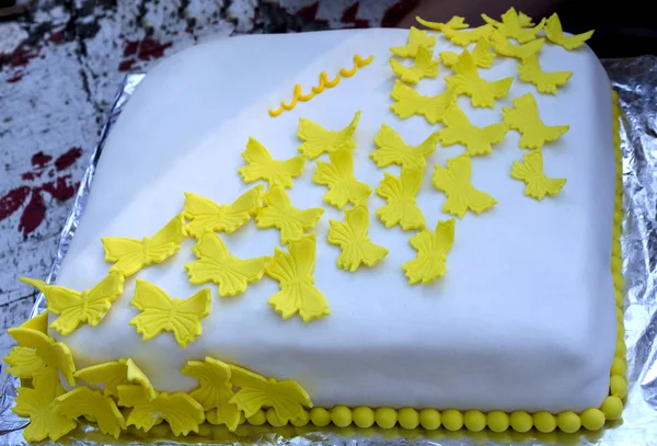 cake with yellow butterflies