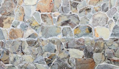 Dokulu duvar çitleri, taş çakıllı çitler, arka plan için yakın plan.