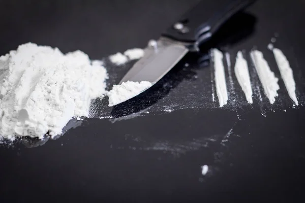 Criminal Concept Cocain Powder Black Table Cocaine Drug Powder Stock Photo  by ©serejkakovalev 181508376