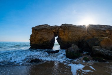 Lanscape of sea cost in sunny day and big rocks 