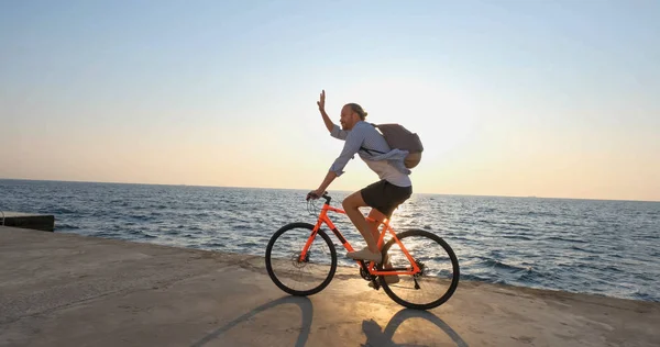 Young Handsome Male Casual Wear Ride Colorful Bicycle Morning Beach — 스톡 사진