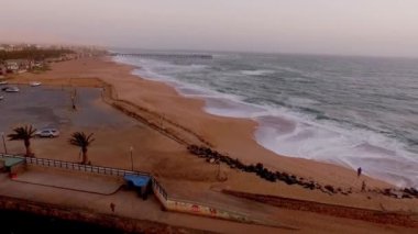Anteni: Gün batımında Swakopmund Beach'te.