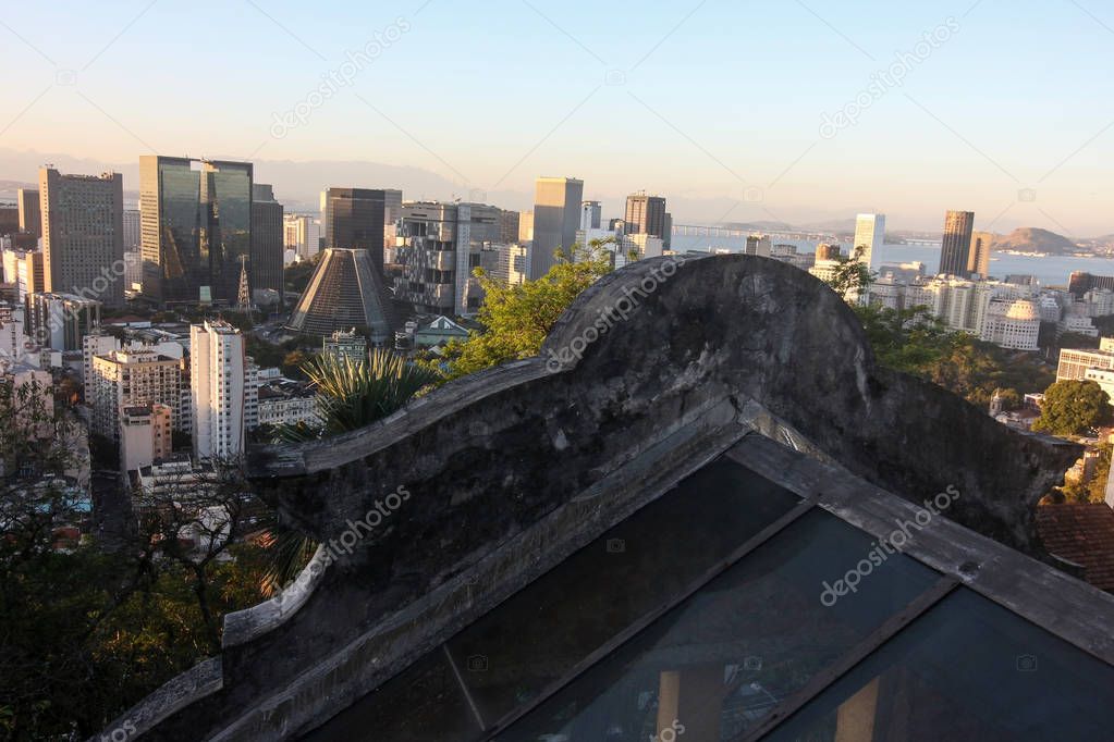 Downtown Rio de Janeiro seen from the top, from the Parque das Ruinas in Santa Teresa. In the foreground, architecture details of Ruins Park, a major tourist attraction in Rio.