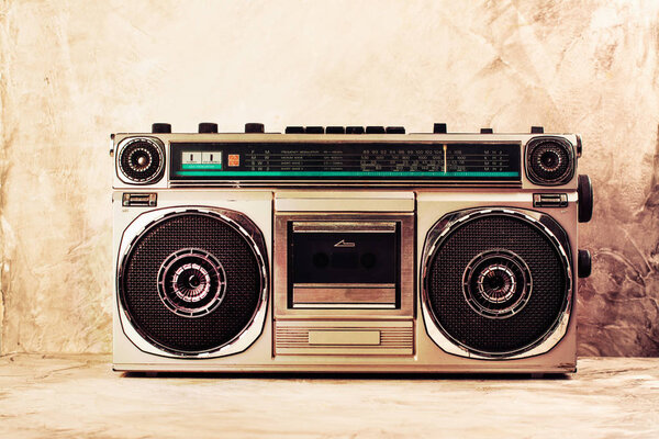 Retro radio cassette stereo player. Toned image. Copy space