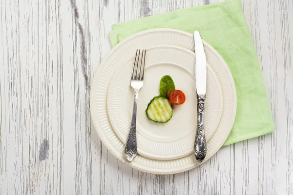 Plate with small portion of food — Stock Photo, Image