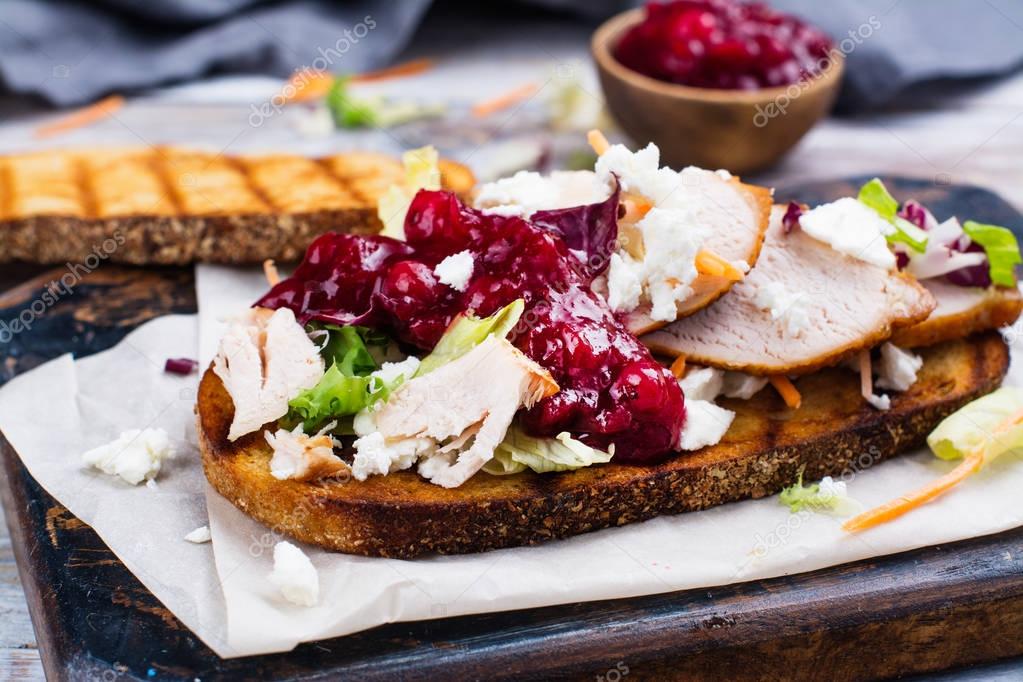 Homemade turkey leftover sandwich with cranberry sauce