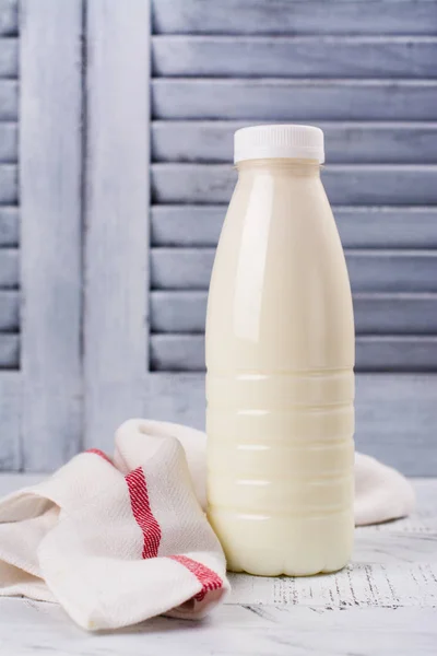 Fresh organic cow milk in a plastic bottle — Stock Photo, Image