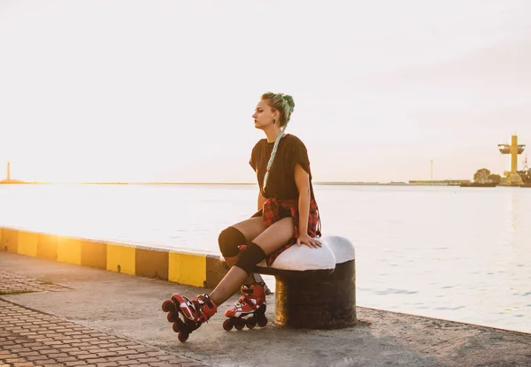 stylish girl with roller skates