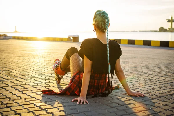 Girl with roller skates near sea port — Stock Photo, Image