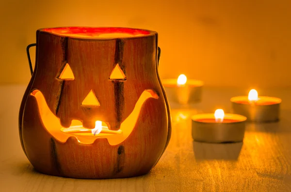 Jack o Lantern Candle Holder on a Wooden Table