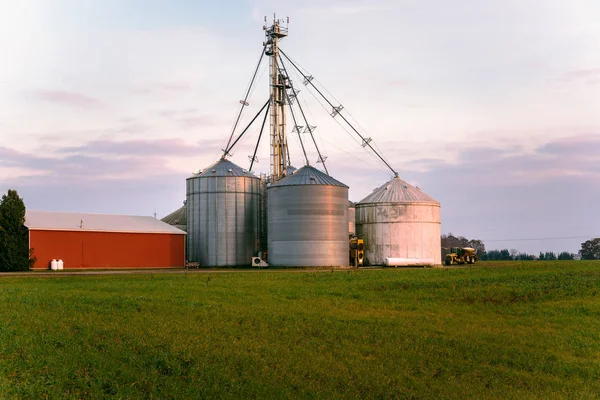 Huge Steel Bins Storage Grain Red Barn Field Sunset — Stock Photo, Image