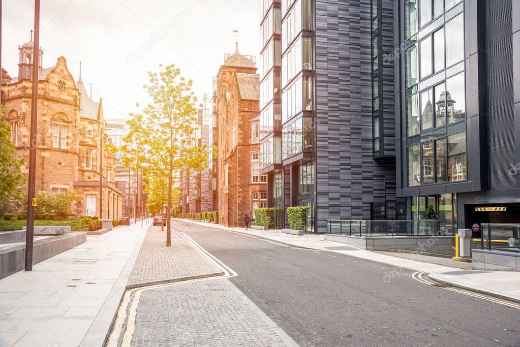 Street lined with both modern and renovated residential buildings. Edinburgh, Scotland, UK.