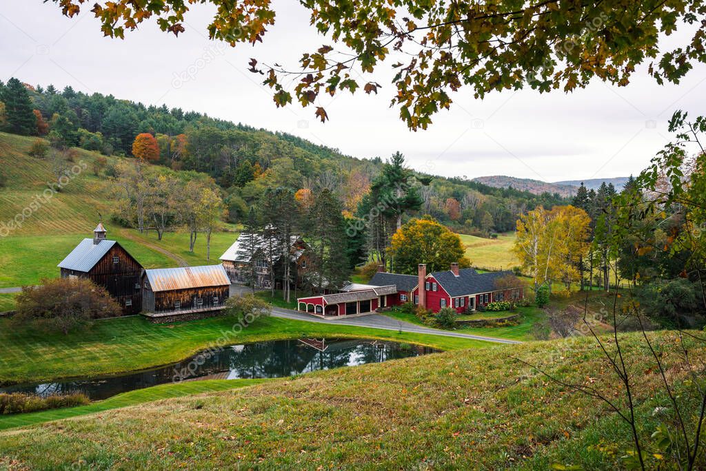 Farm in a rural landscape in Vermont, USA, on a cloudy autumn day