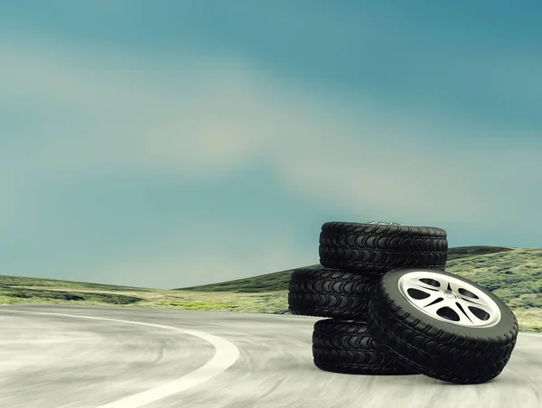 Cuatro ruedas de automóvil en la carretera. 3d renderizar —  Fotos de Stock